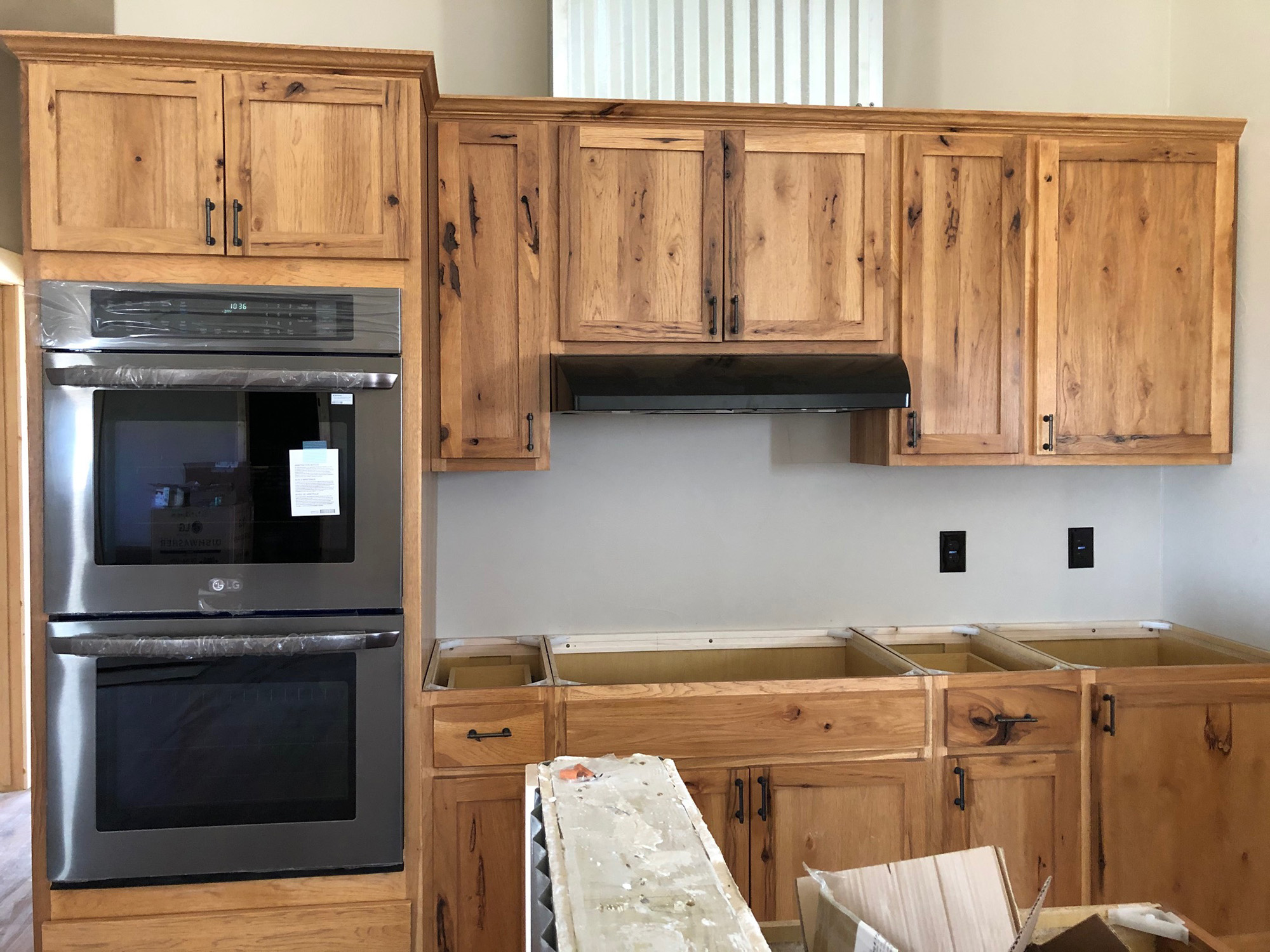 Fat Puppy's barndominium featured project showing cabinets and oven