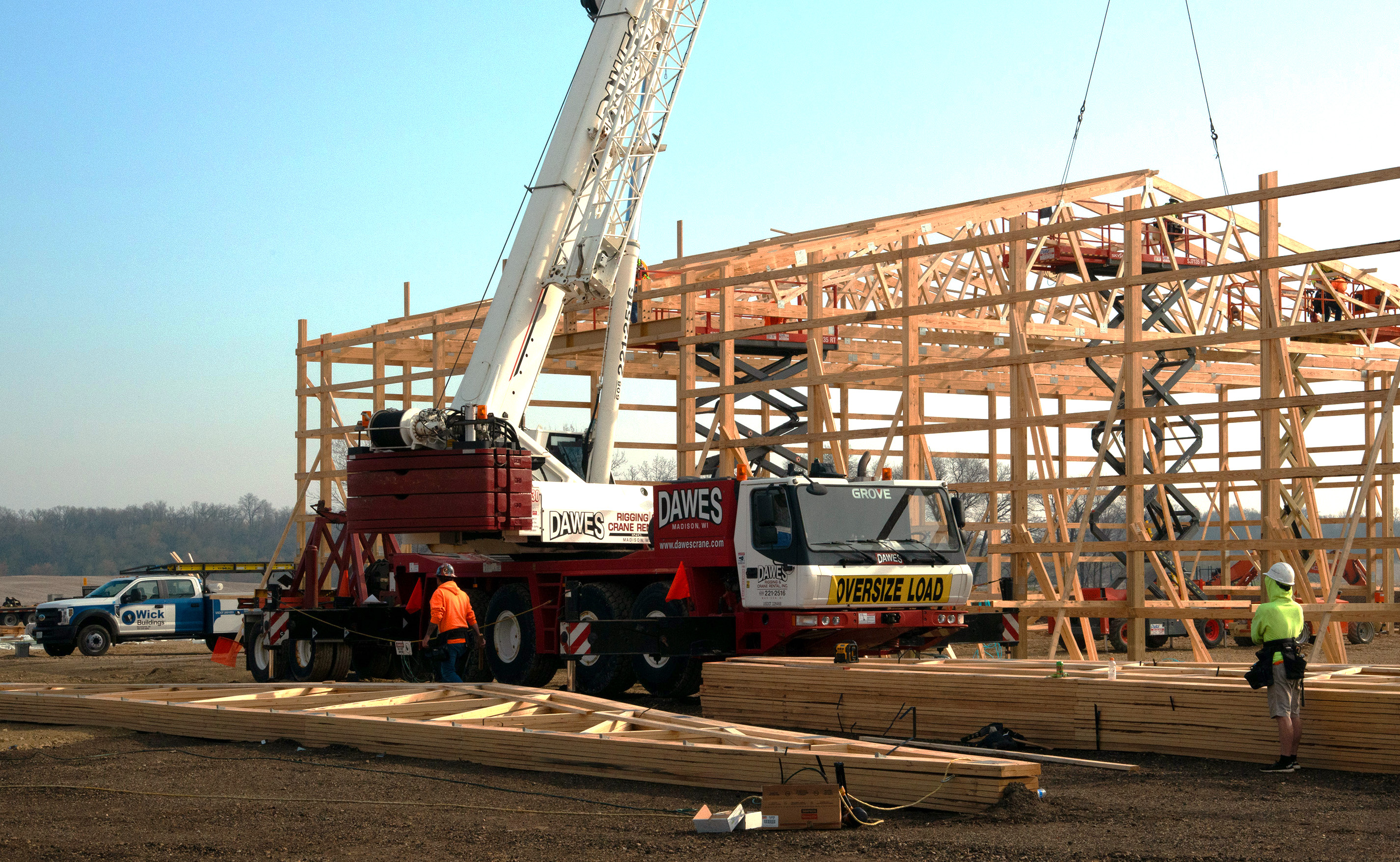 work being done on a post frame construction site